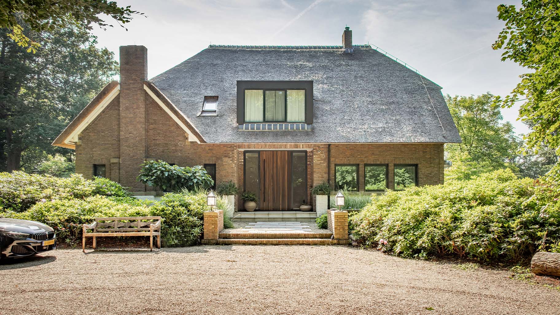 Taatsdeur als voordeur Padoek hout